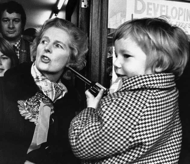 then-conservative-party-leader-margaret-thatcher-chats-with-a-gun-toting-four-year-old-in-1976
