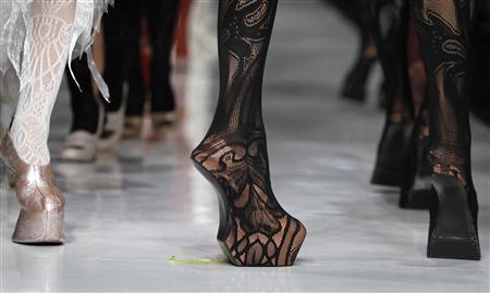 Models present creations by designer Somarta during a Fashion Week show in Jakarta